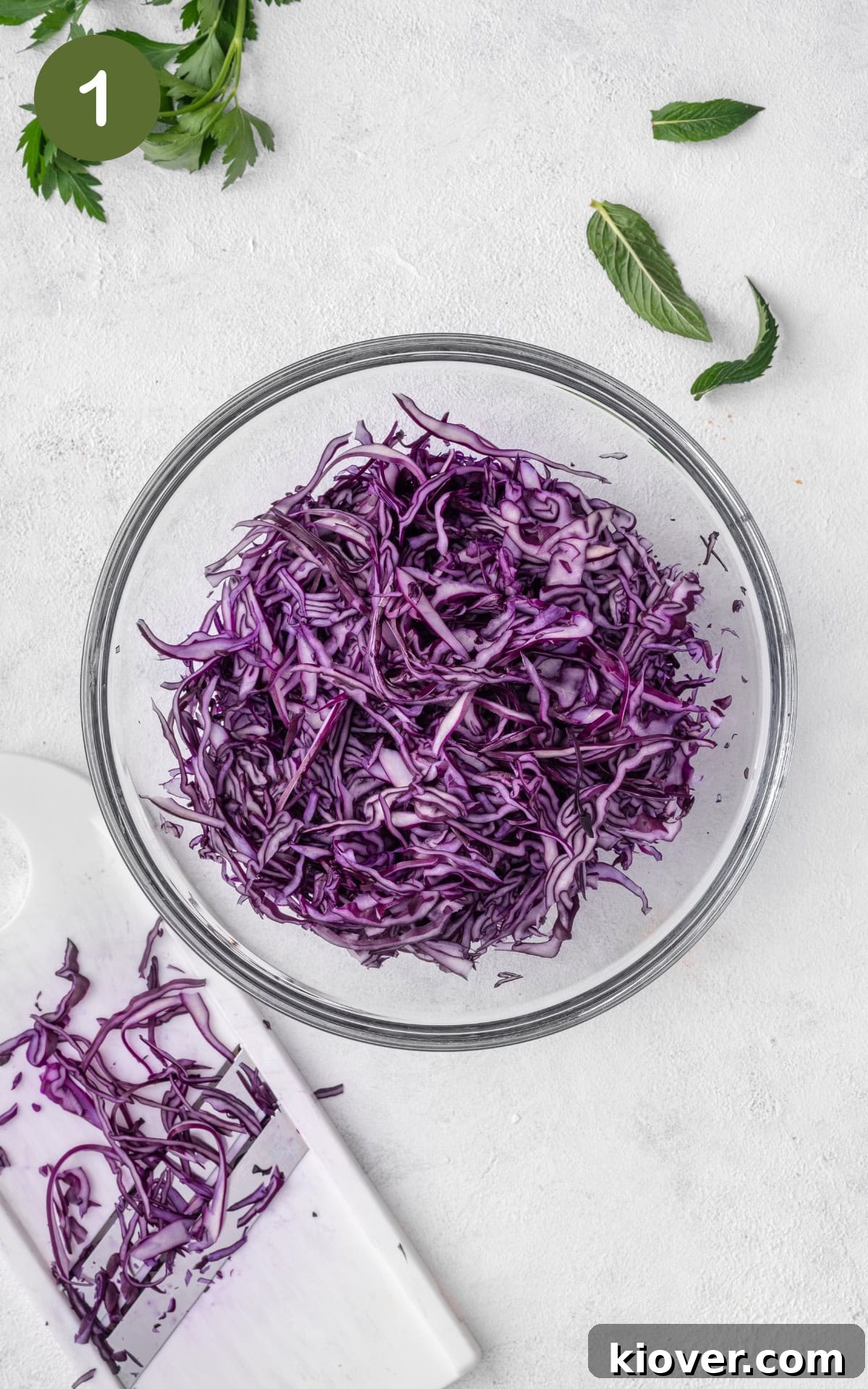 Shredded red cabbage in a bowl.