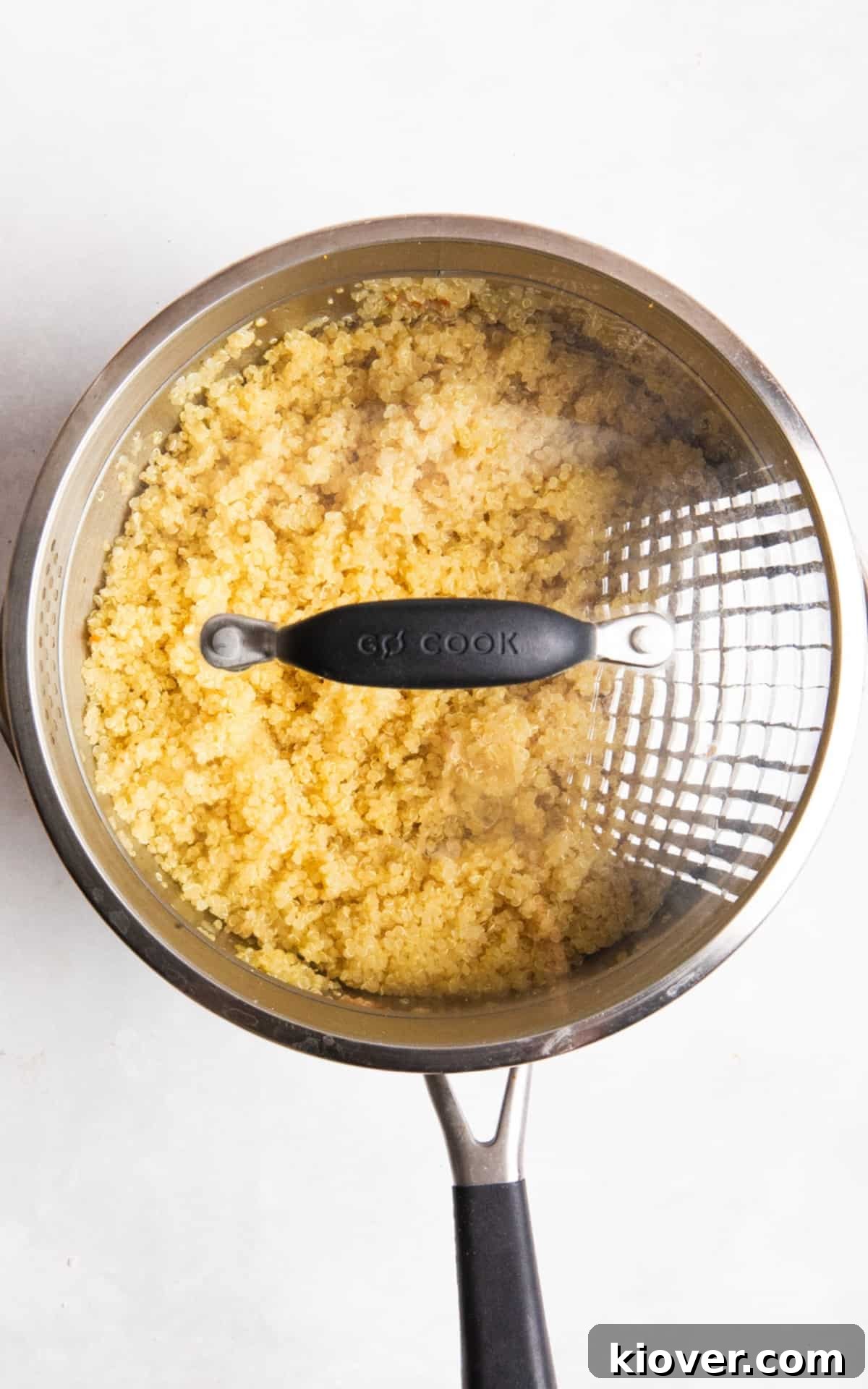 quinoa in a pot covered with a lid.