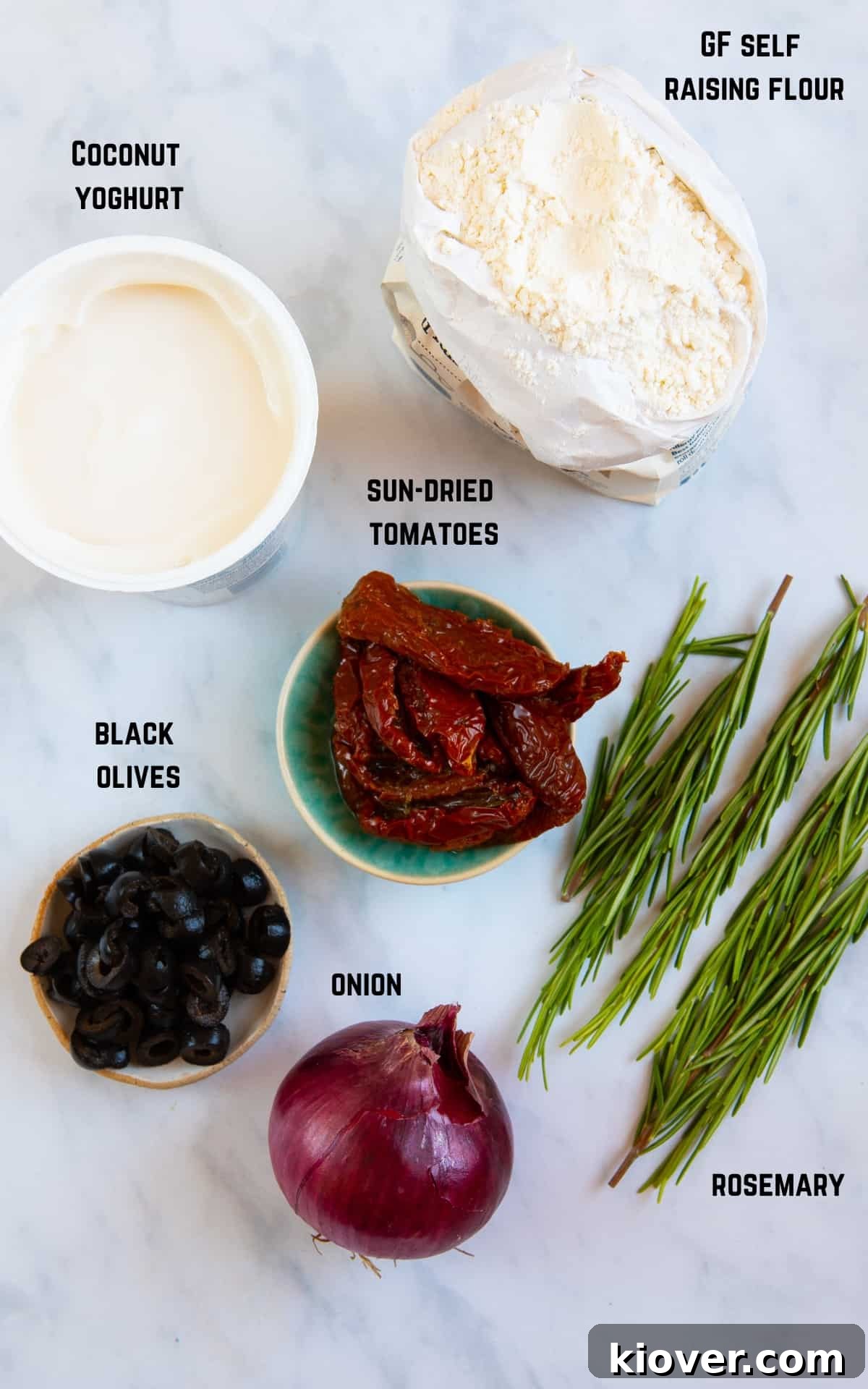 Ingredients to make gluten free focaccia on white background