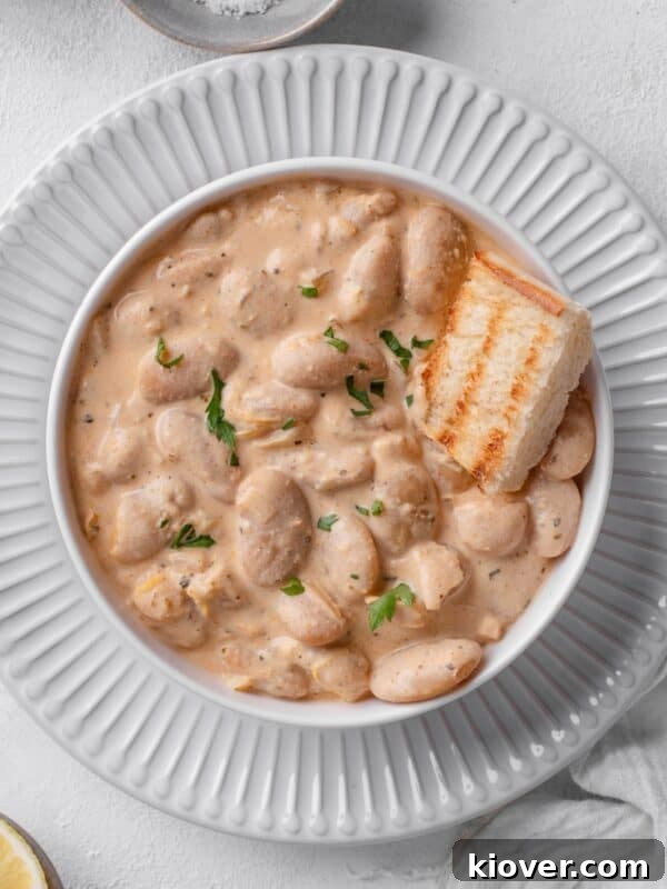 Spicy Butter Beans Recipe: Flavorful One-Pot Side Dish 6 Creamy Butterbeans served with toast.