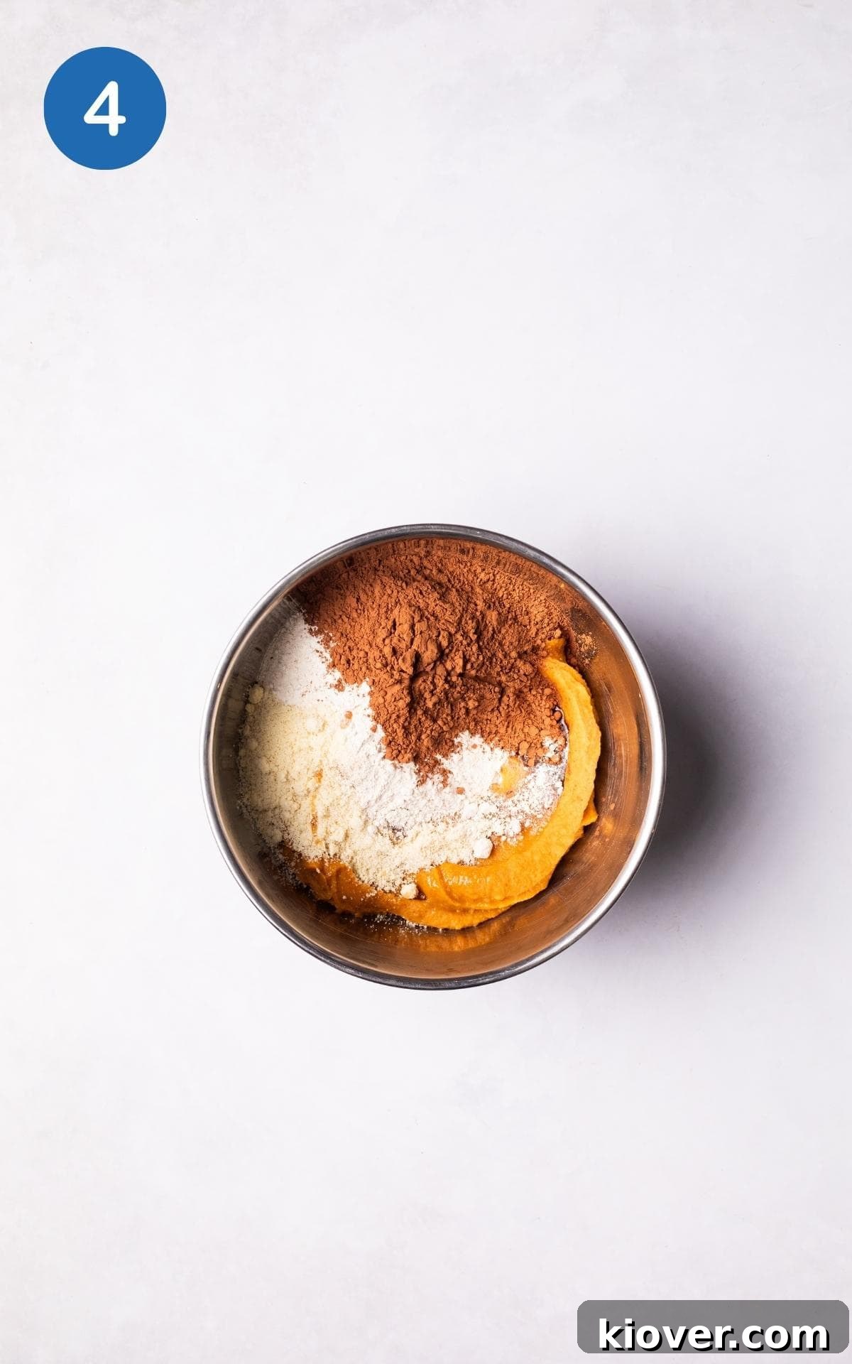 Fudgy Sweet Potato Brownies Recipe with Cocoa and Maple 7 Ingredients to make Sweet Potato Brownies in a mixing bowl.