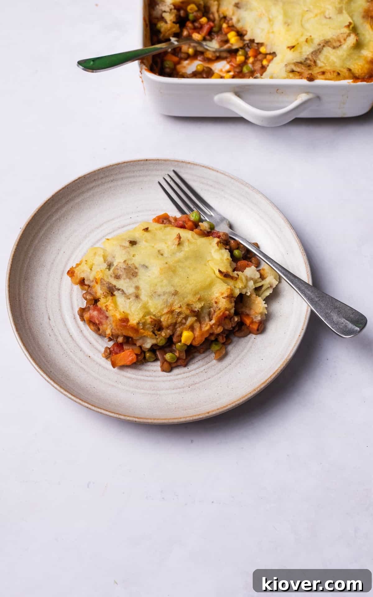 Hearty Lentil Cottage Pie Recipe for Comforting Weeknight Dinners 9 cottage pie with lentils topped with mashed potatoes.
