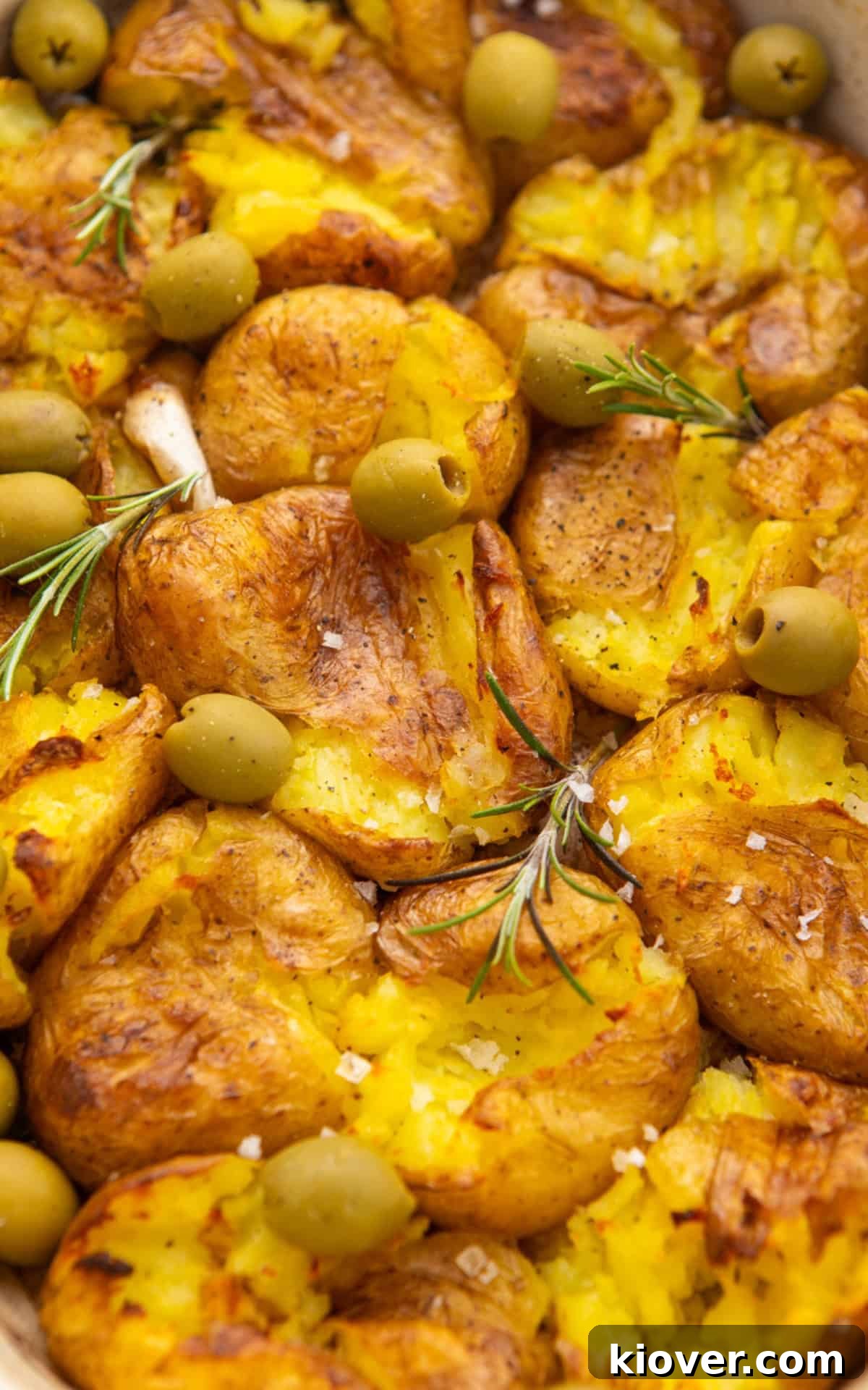 Crispy Smashed Potatoes with Garlic and Parmesan 7 baby potatoes with olives from the oven.