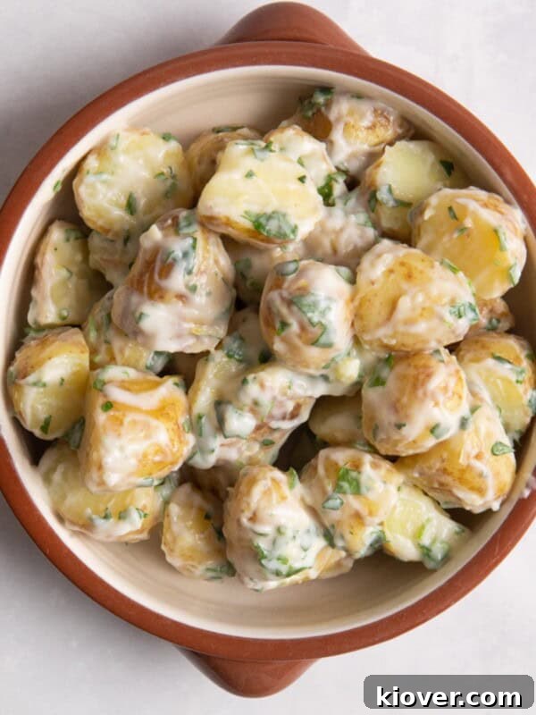 Crispy Smashed Potatoes with Garlic and Parmesan 9 potato salad in brown bowl