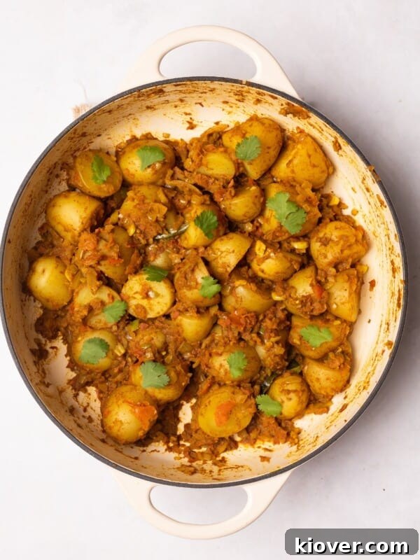 Crispy Smashed Potatoes with Garlic and Parmesan 10 Bombay Aloo (bombay potatoes) garnished with fresh corriander.