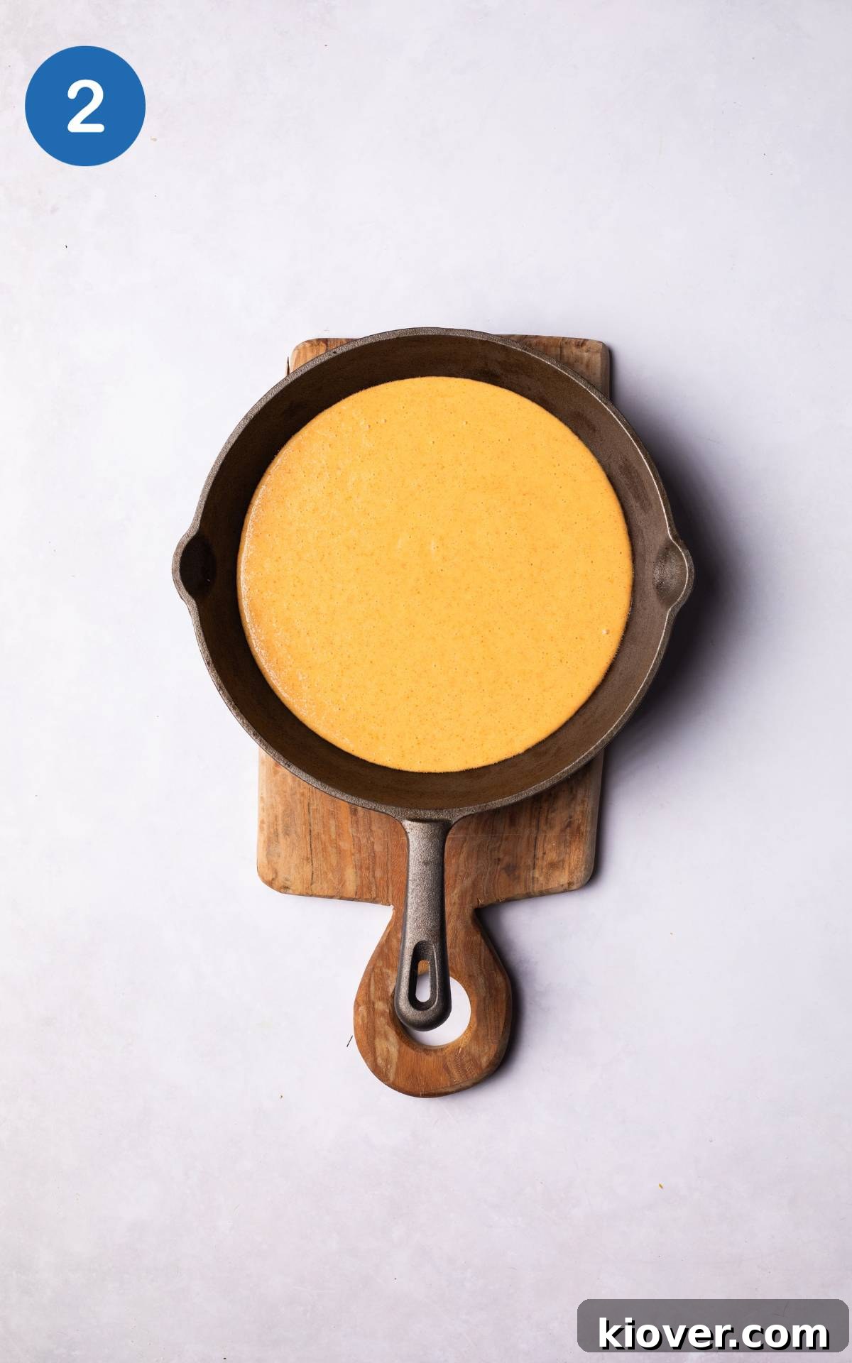 Crispy Socca Chickpea Pancake Recipe for Beginners 5 batter for socca flatbread poured into skillet pan.