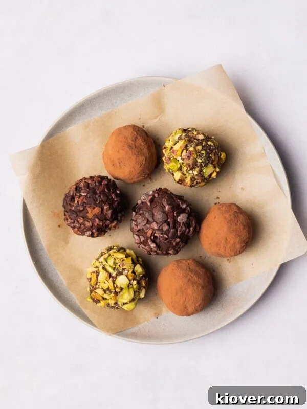 Vegan Chocolate Truffles on a plate with different toppings.