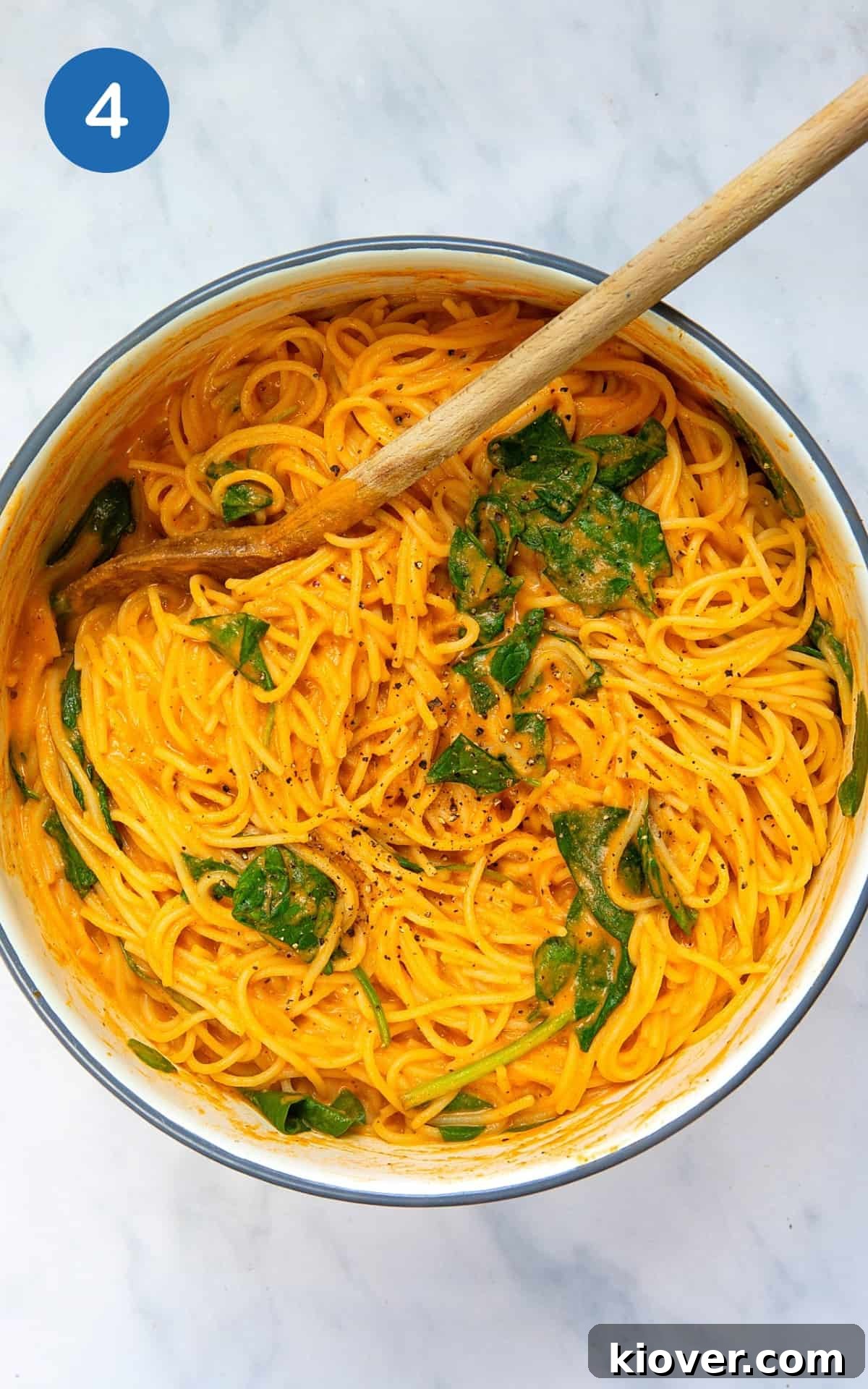 Creamy Roasted Red Pepper Pasta Recipe for Dinner Tonight 7 red pepper sauce mixed into spaghetti in a large pot ready to serve.