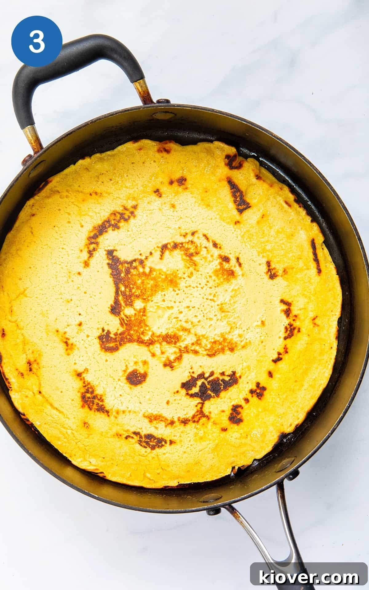 gluten free pizza base fried in a pan.
