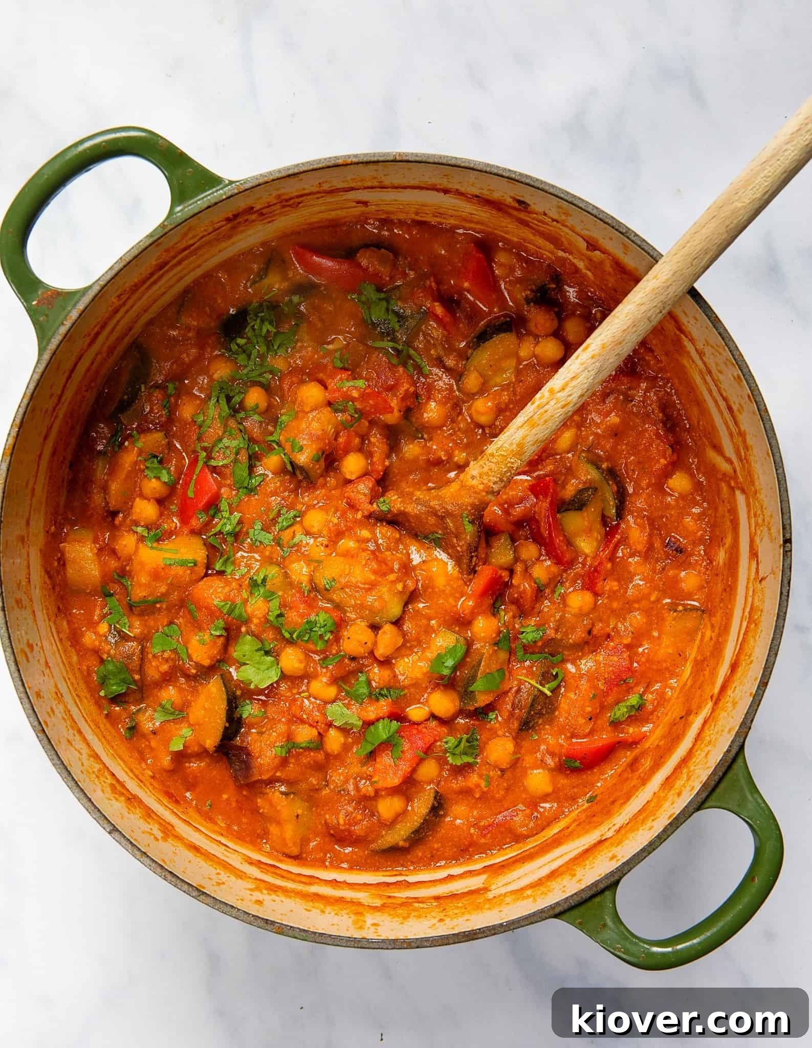 Apricot and Chickpea Tagine Recipe: Moroccan-Inspired Vegetable Stew 6 Apricot & Chickpea Tagine - Pot spoon