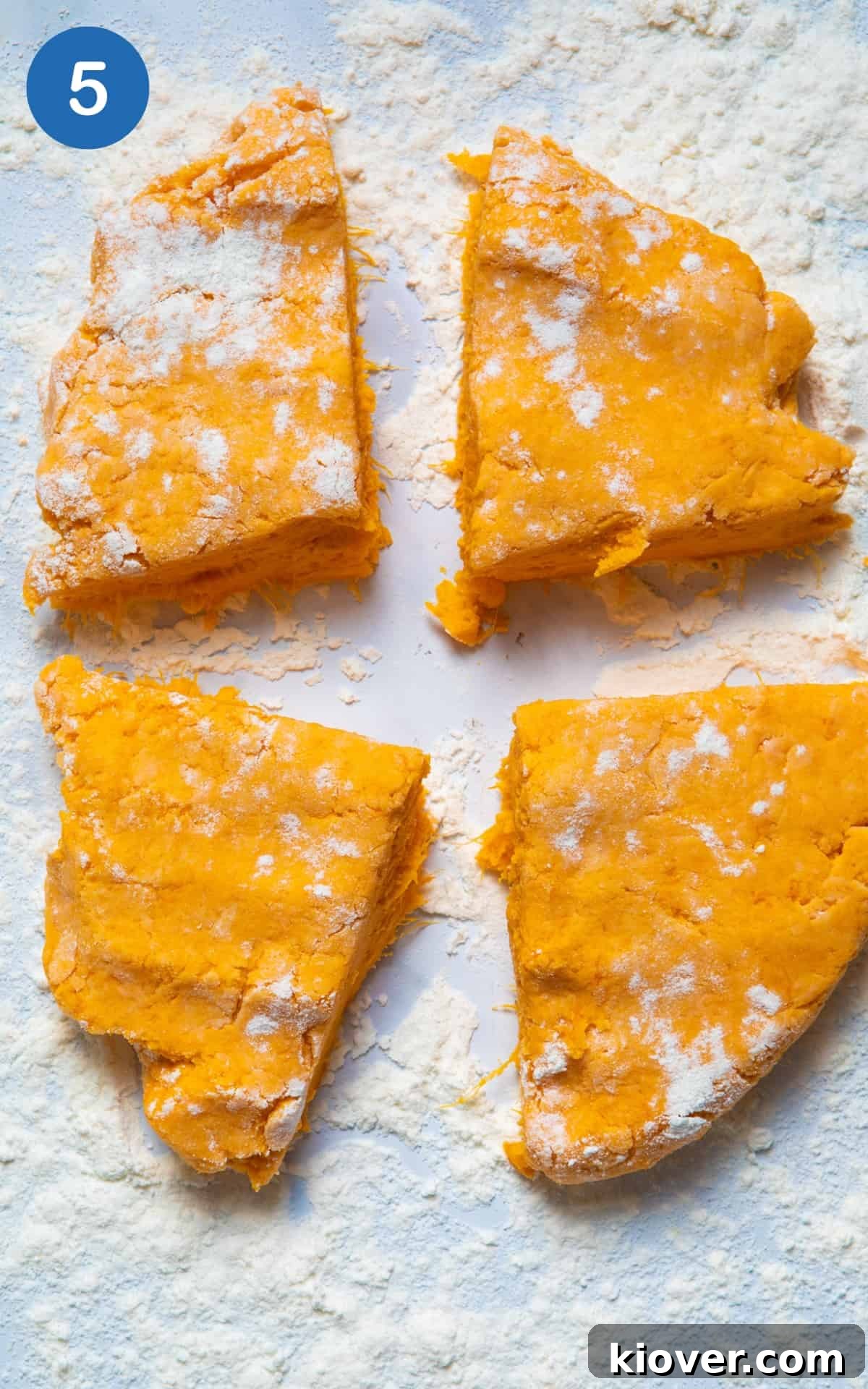 Sweet Potato Gnocchi Recipe: Light, Fluffy & Flavorful 8 dough cut into 4 squares on white marble surface.