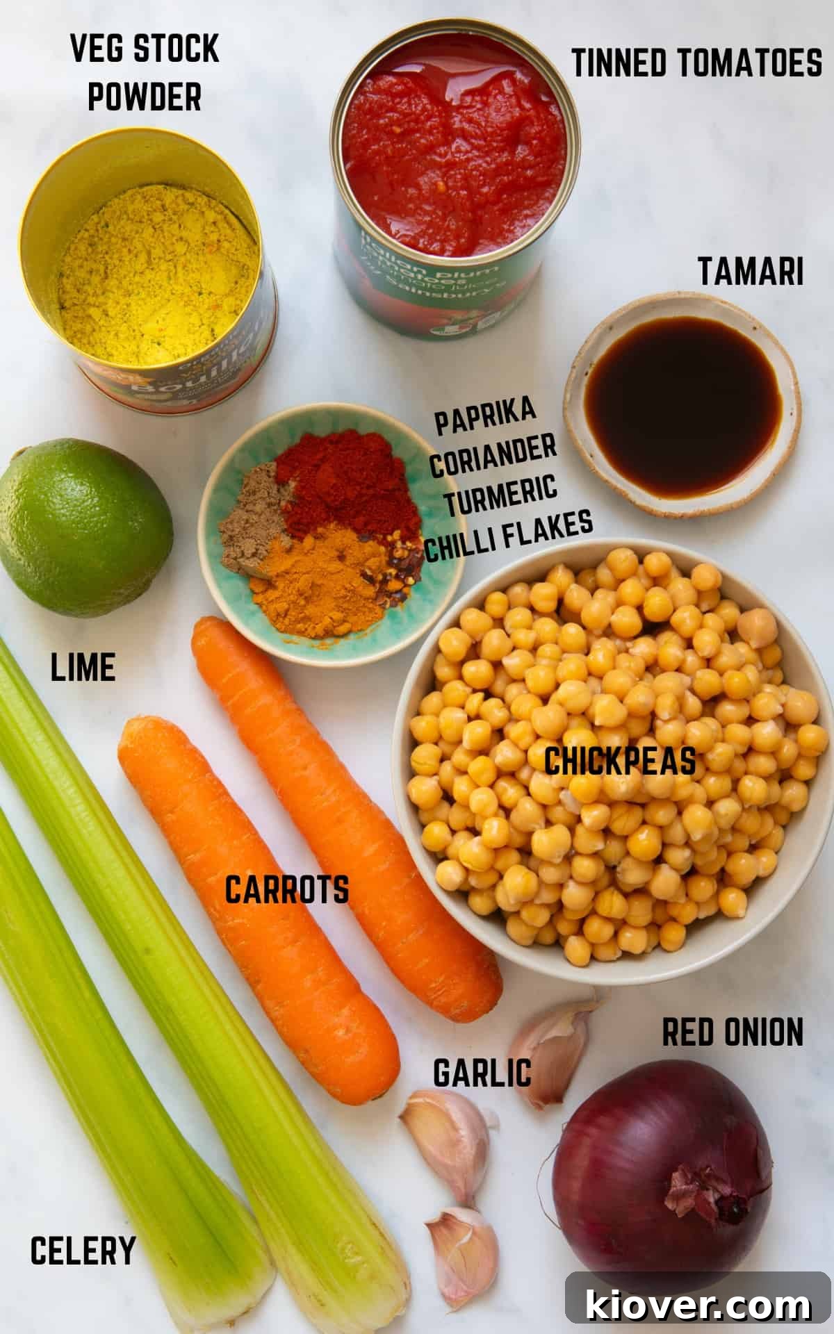 Ingredients to make chickpea stew on white background.