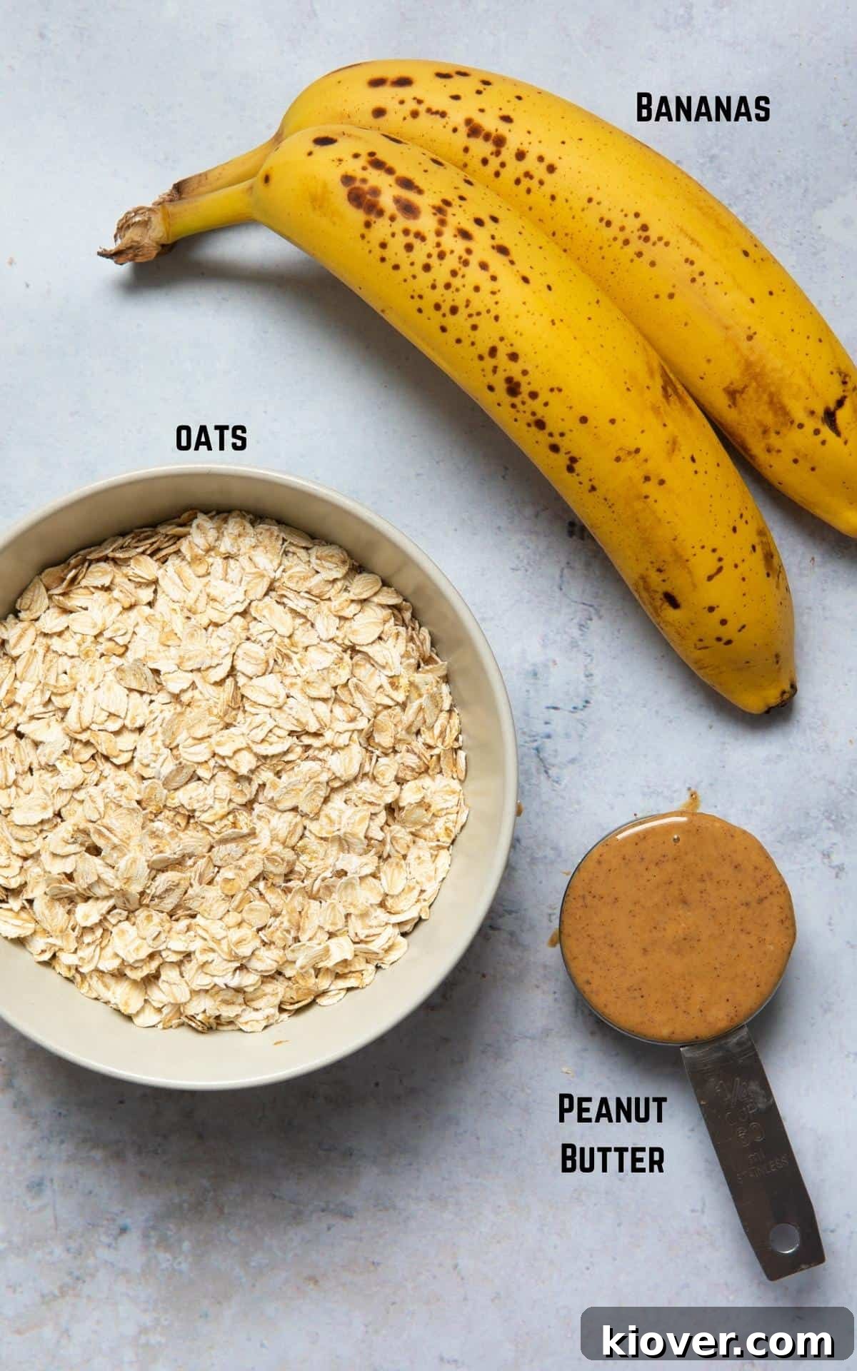 Ingredients to make 3 Ingredient Oat Cookies displayed on white background.