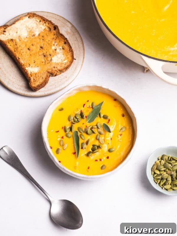 Creamy Pumpkin & Butternut Soup Recipe for Fall Comfort 10 Butternut Squash Soup served with toast and pumpkin seeds.