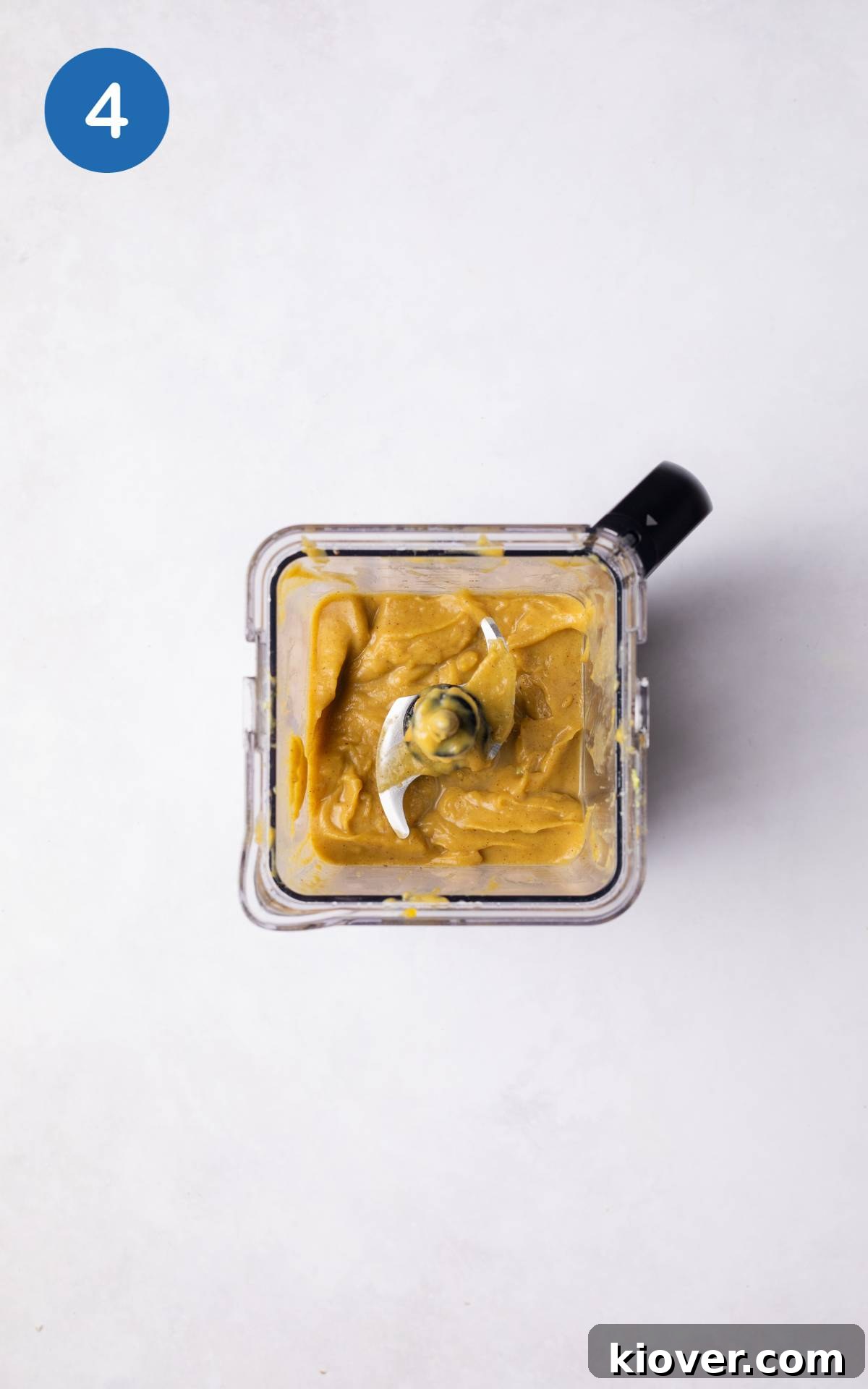 Blending topping ingredients for No Bake Pumpkin pie in a food processor.