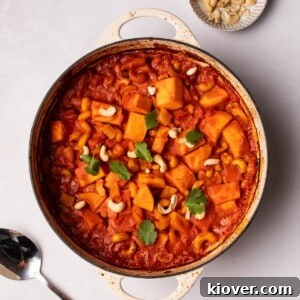 Butternut Squash Curry served in a large white pot.