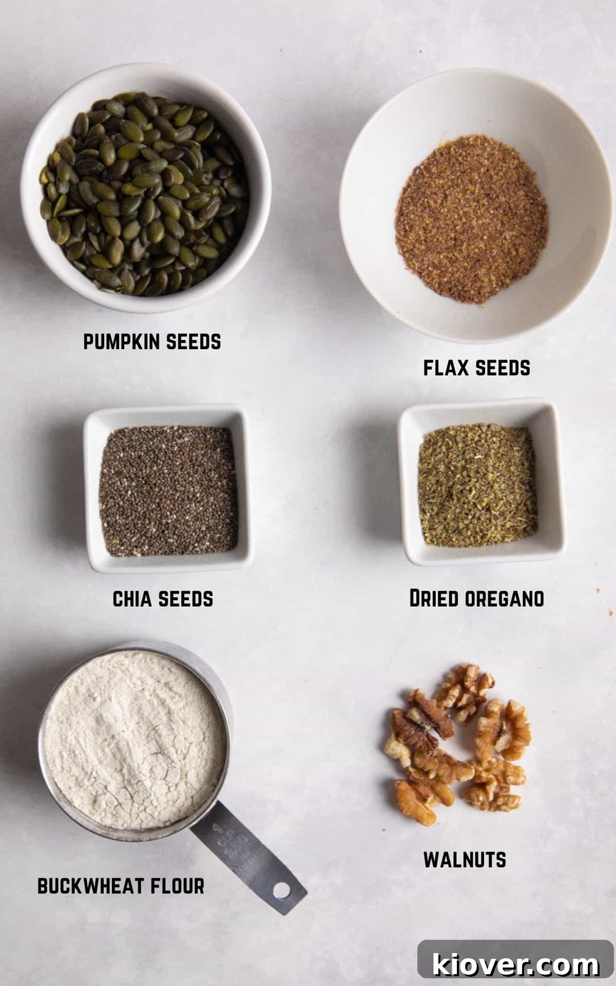 ingredients to make gluten free seeded bread on white surface.