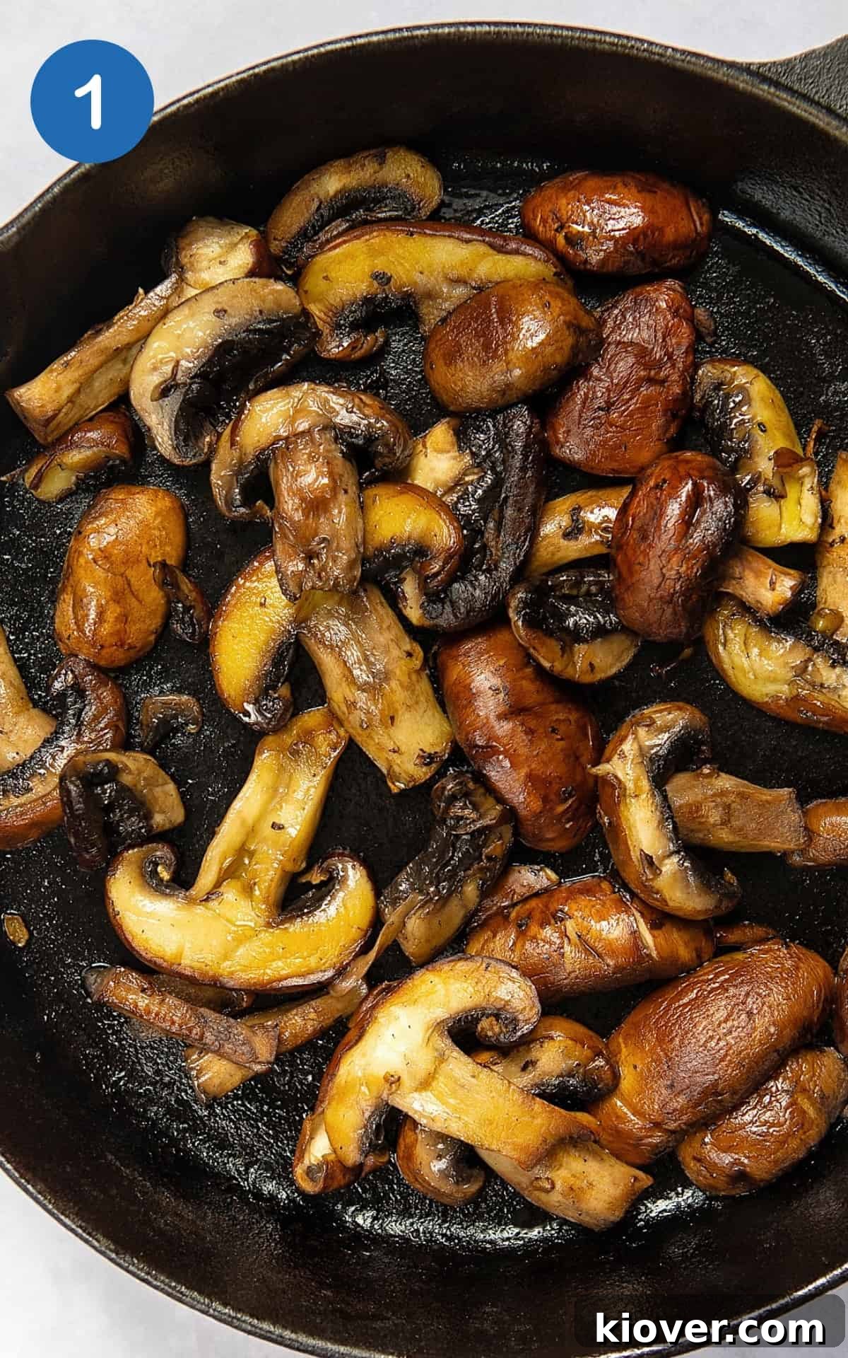 Creamy Mushroom Alfredo Pasta Recipe for Dinner 4 Chopped mushrooms in a pan.